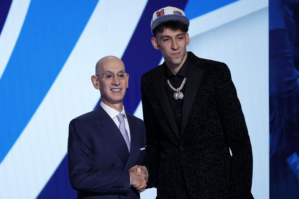 NBA commissioner Adam Silver on the left and Chet Holmgren on the right pose for photo after Holmgren was drafted with the 2nd overall pick by the Oklahoma City Thunder during the 2022 NBA Draft at Barclays Center on June 23, 2022 in New 