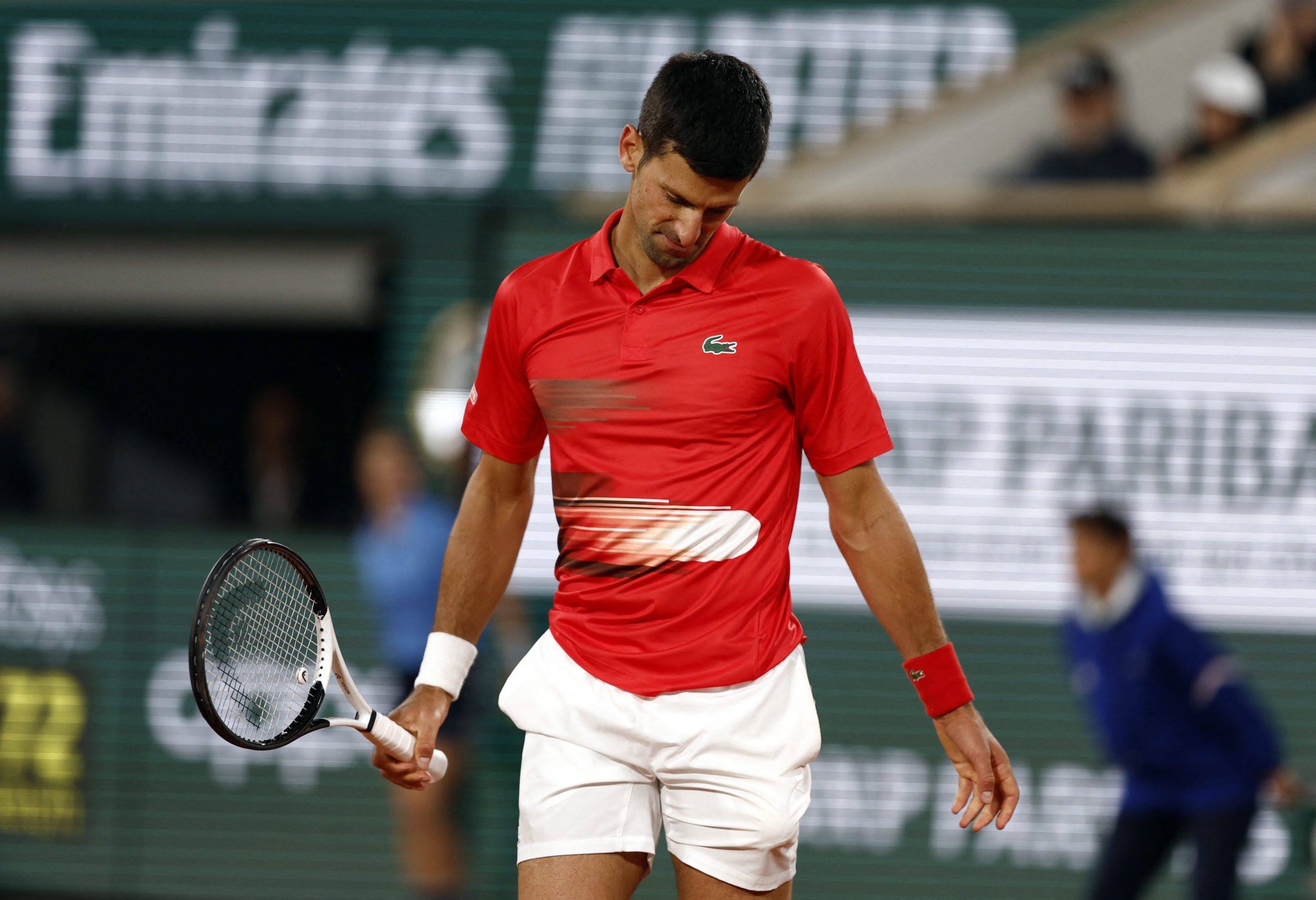 Tennis - French Open - Roland Garros, Paris, France - June 1, 2022  Serbia's Novak Djokovic reacts during his quarter final match against Spain's Rafael Nadal REUTERS/Gonzalo Fuentes
