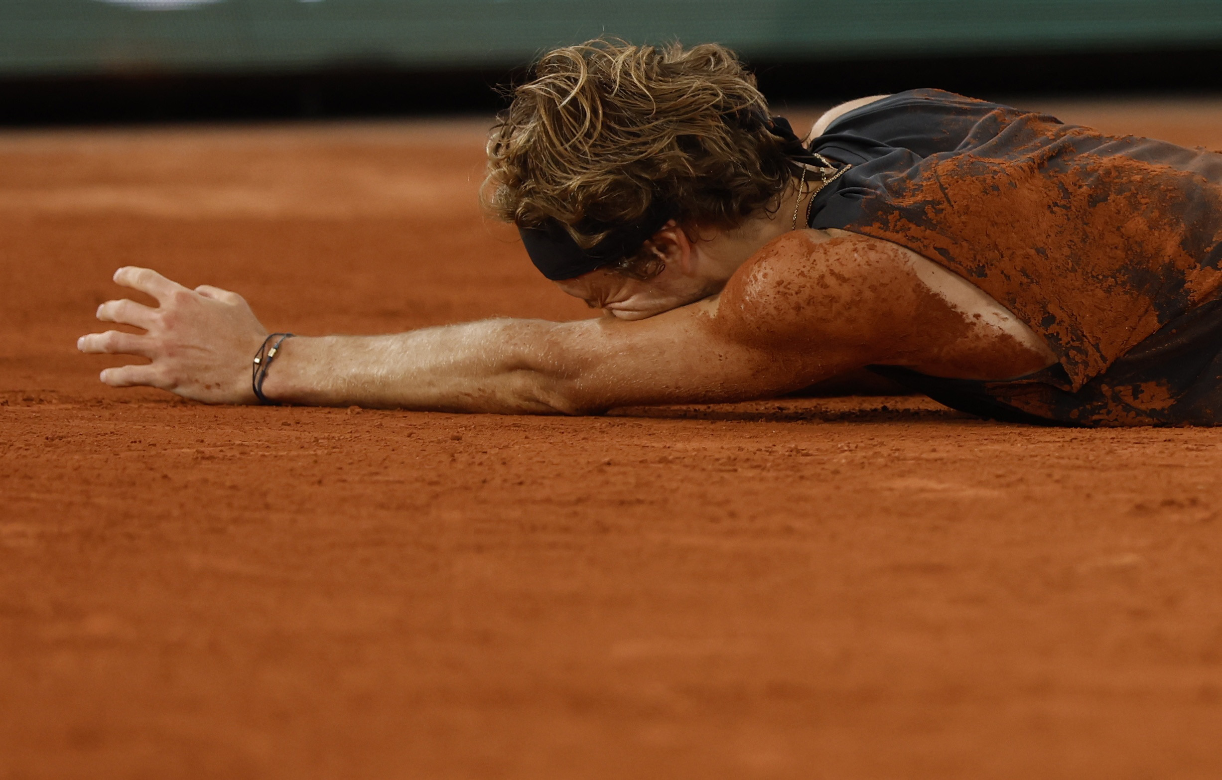 Tennis - French Open - Roland Garros, Paris, France - June 3, 2022 Germany's Alexander Zverev reacts after sustaining an injury during his semi final match against Spain's Rafael Nadal REUTERS/Yves Herman
