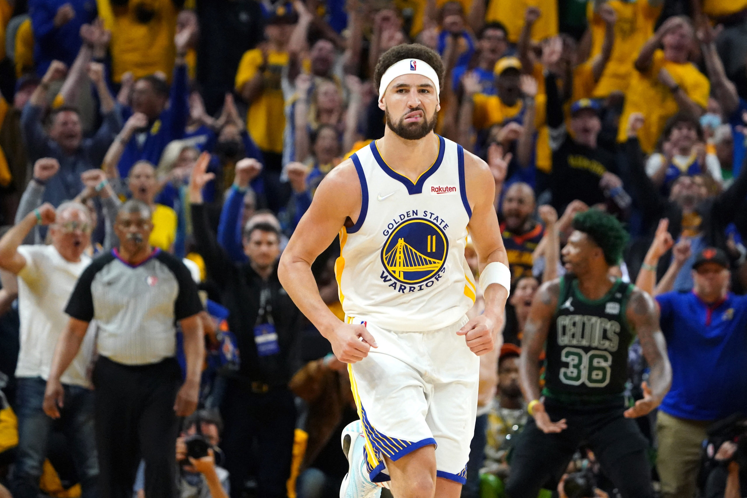 Jun 13, 2022; San Francisco, California, USA; Golden State Warriors guard Klay Thompson (11) reacts after making a three-point basket during the second half in game five of the 2022 NBA Finals against the Boston Celtics at Chase Center. Mandatory Credit: Kyle Terada-USA TODAY Sports