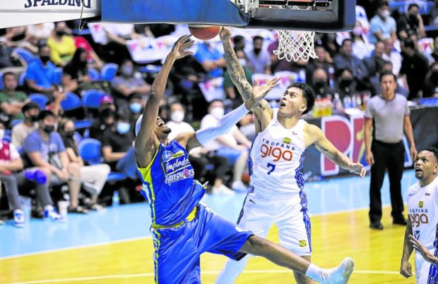 Poy Erram (right, photo above) and the rest of the Tropang Giga have become Chot Reyes’ “refuge” of late. —PBA IMAGES