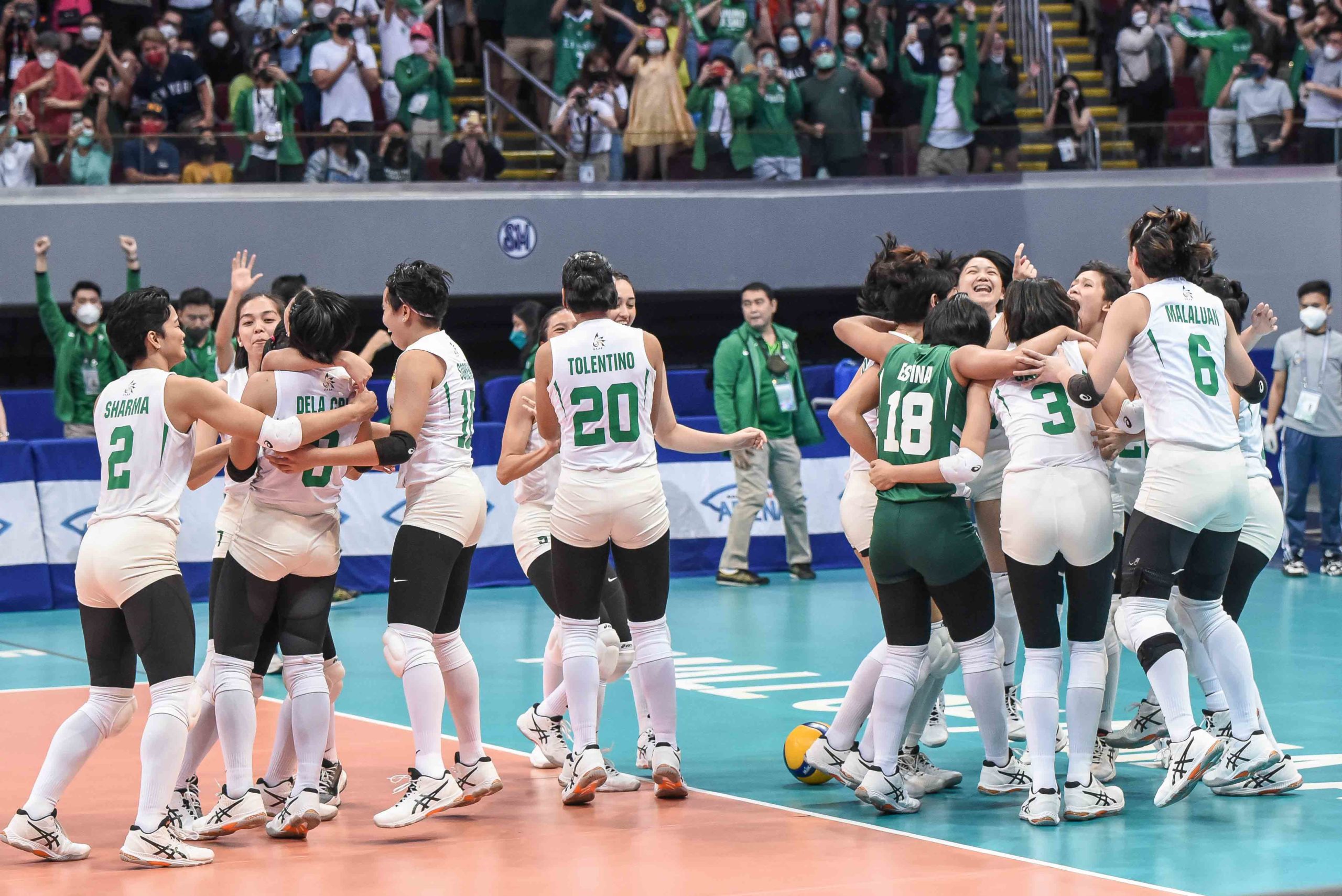 La Salle Lady Spikers celebrate victory over Ateneo that brought them back to the UAAP Finals.