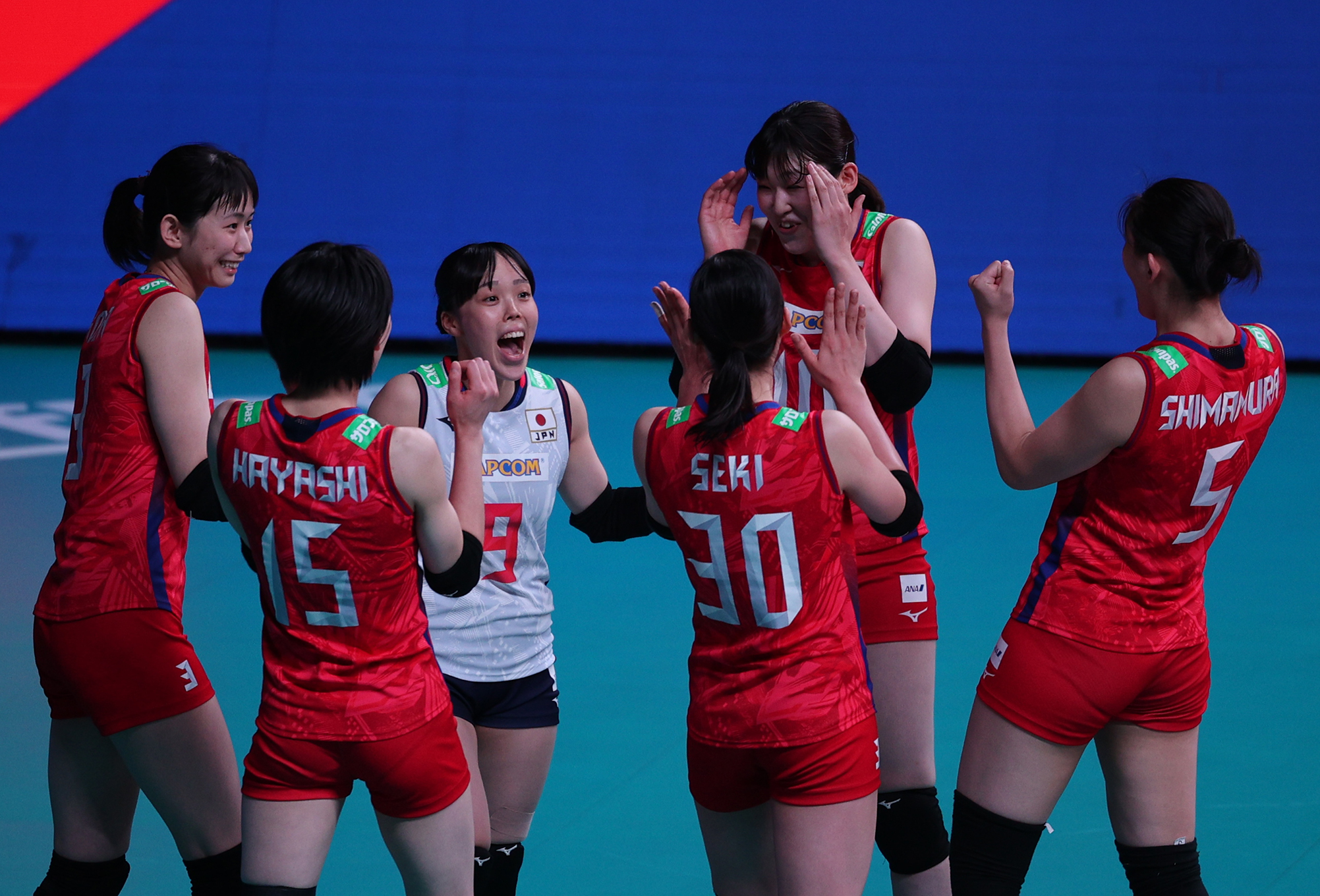 Japan celebrates win in VNL Week 2 in Manila.