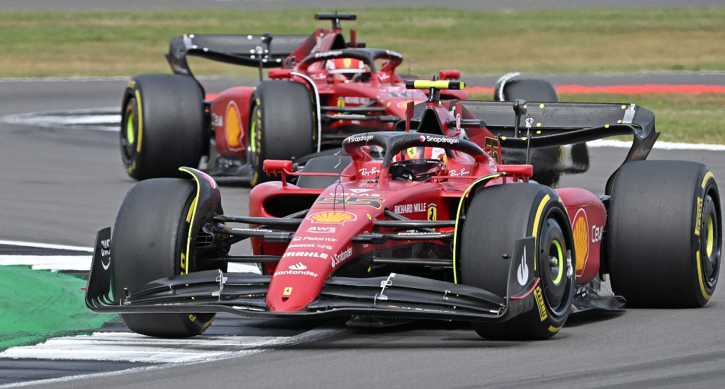 Ferrari's Spanish driver Carlos Sainz Jr (L) leads Ferrari's Monegasque driver Charles Leclerc during the Formula One British Grand Prix at the Silverstone motor racing circuit in Silverstone, central England on July 3, 2022.