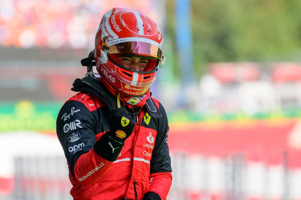 Ferrari's Monegasque driver Charles Leclerc celebrates after winning the Formula One Austrian Grand Prix on the Red Bull Ring race track in Spielberg, Austria, on July 10, 2022.