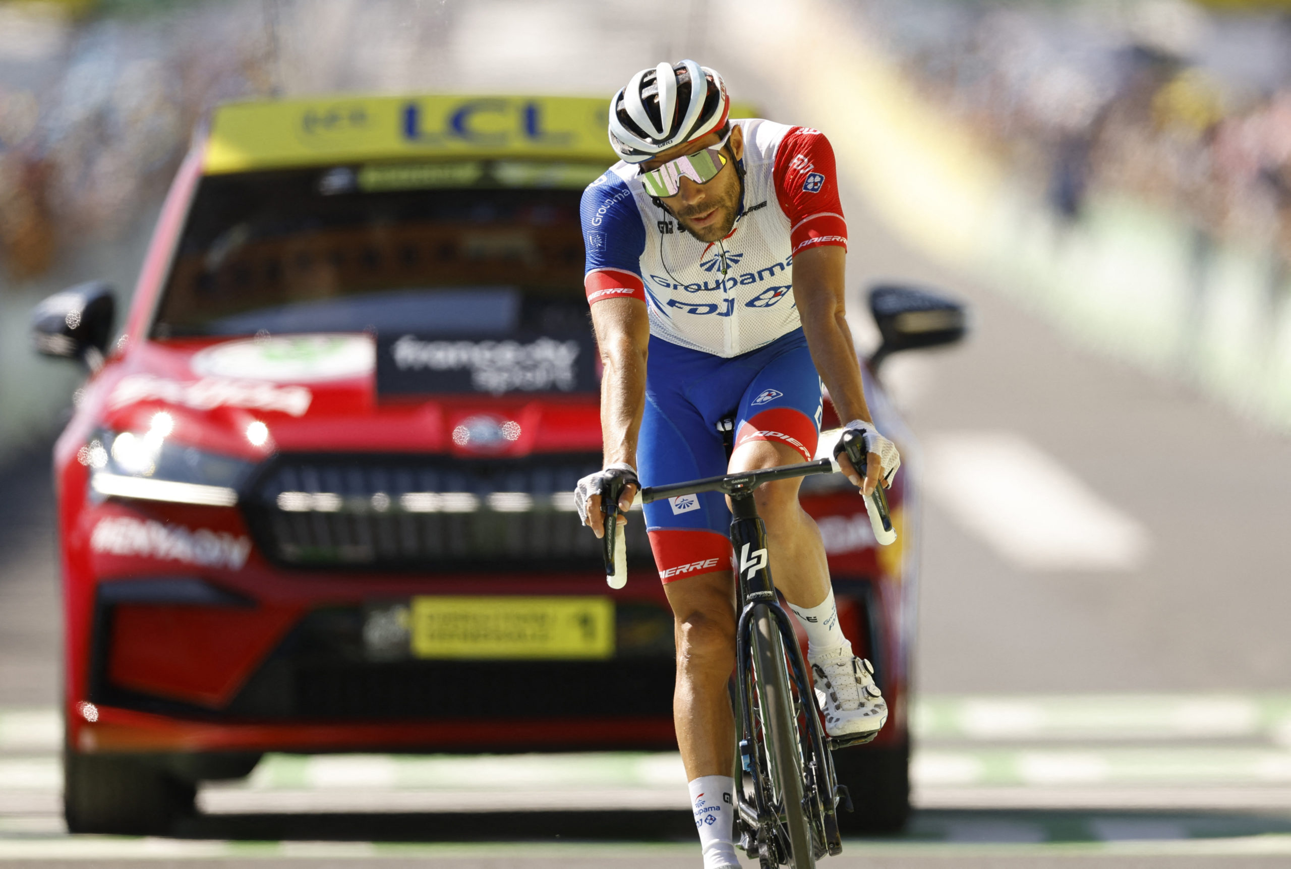 FDJ's Thibaut Pinot crosses the finish line after stage 14 