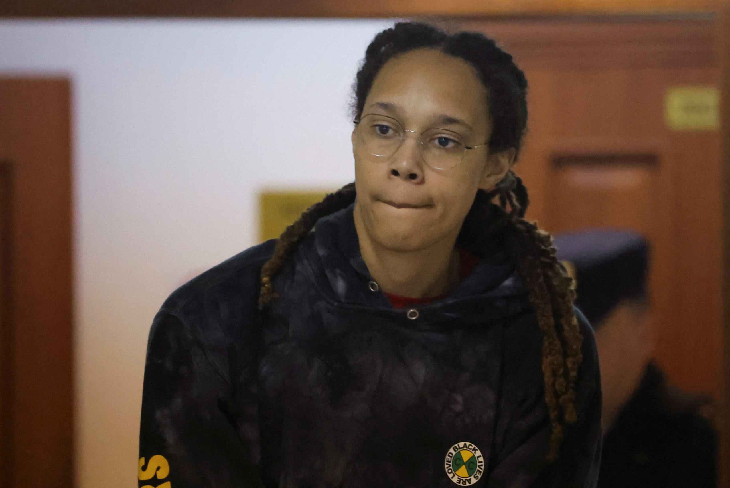 U.S. basketball player Brittney Griner, who was detained at Moscow's Sheremetyevo airport and later charged with illegal possession of cannabis, is escorted before a court hearing in Khimki outside Moscow, Russia July 26, 2022.