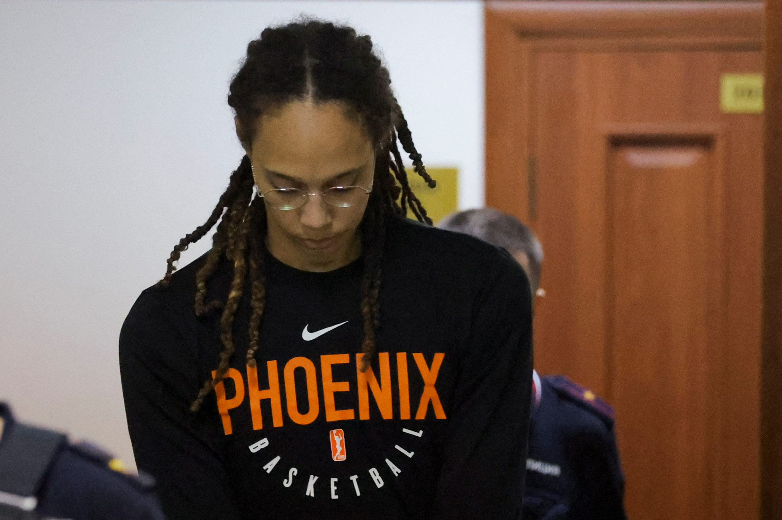 FILE PHOTO: U.S. basketball player Brittney Griner, who was detained at Moscow's Sheremetyevo airport and later charged with illegal possession of cannabis, is escorted before a court hearing in Khimki outside Moscow, Russia July 27, 2022. 