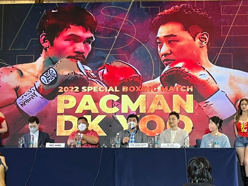 Boxing legend Manny Pacquiao and South Korean YouTuber DK Yoo during a press conference.