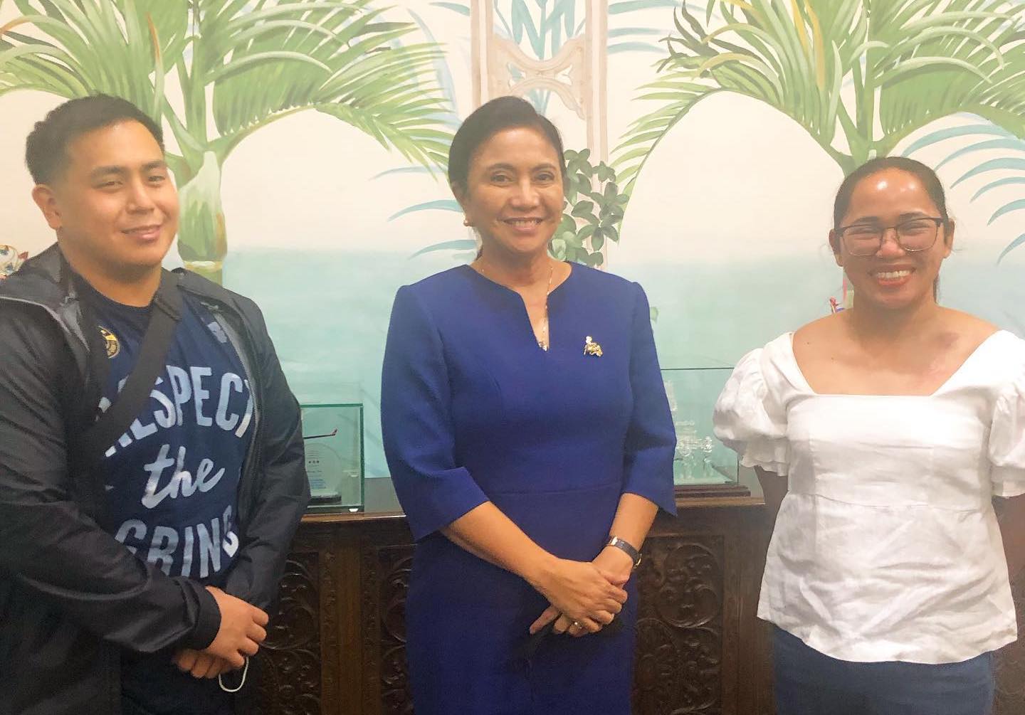 Former Vice President Leni Robredo (middle) with the soon to be wed couple Julius Naranjo  and Hidilyn Diaz.