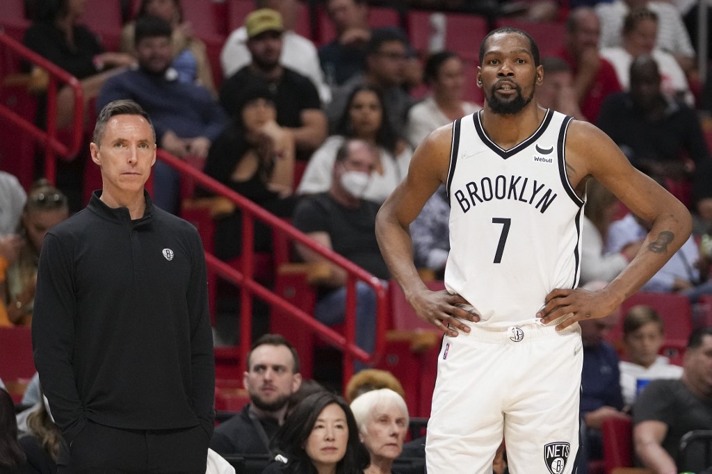 FILE – Head Coach Steve Nash and Kevin Durant #7 of the Brooklyn Nets look on during the second half against the Miami Heat at FTX Arena on March 26, 2022 in Miami, Florida.