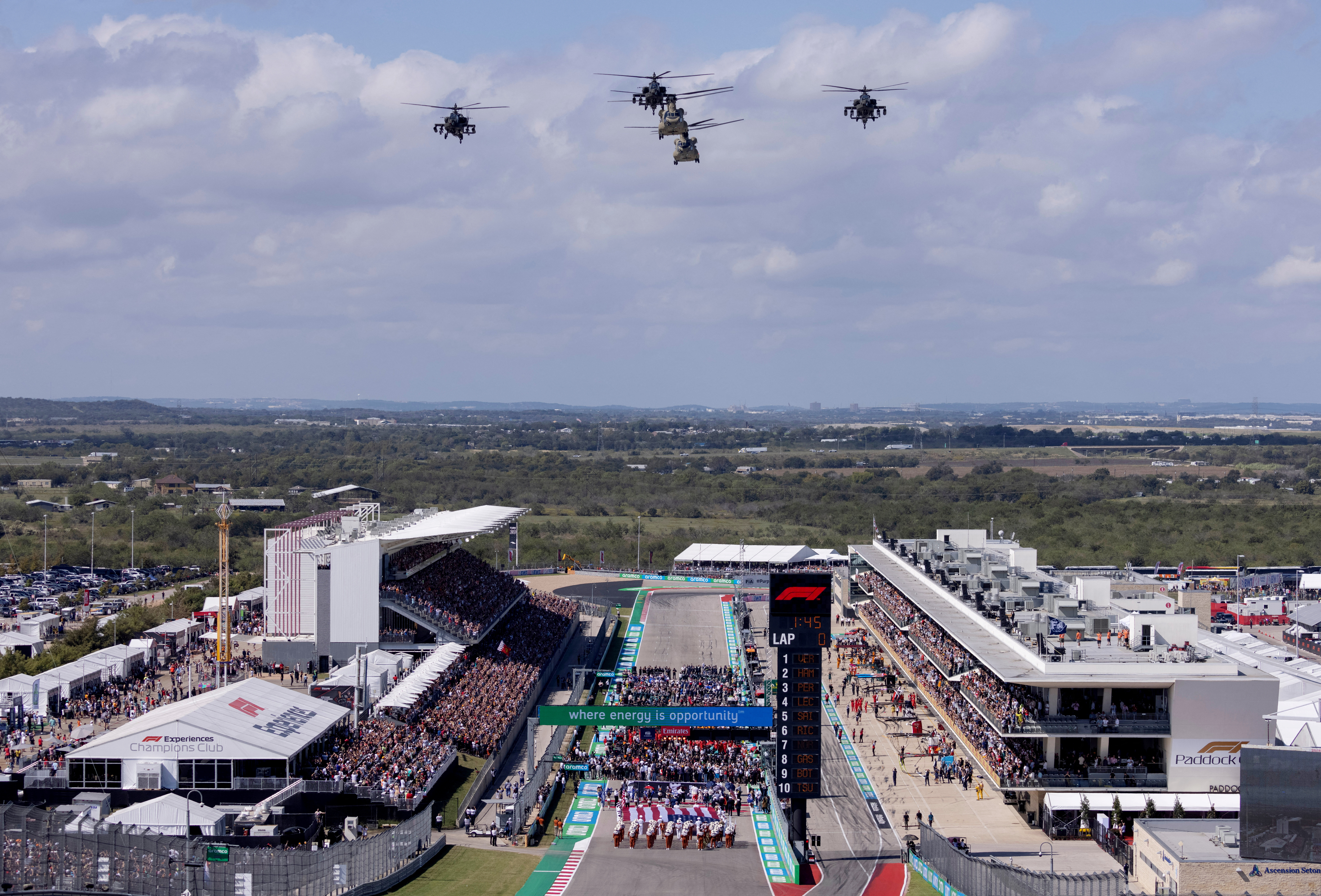 FILE PHOTO: Formula One F1 - United States Grand Prix - Circuit of the Americas, Austin, Texas, U.S. - October 24, 2021 General view as military helicopters do a fly by before the start of the race 