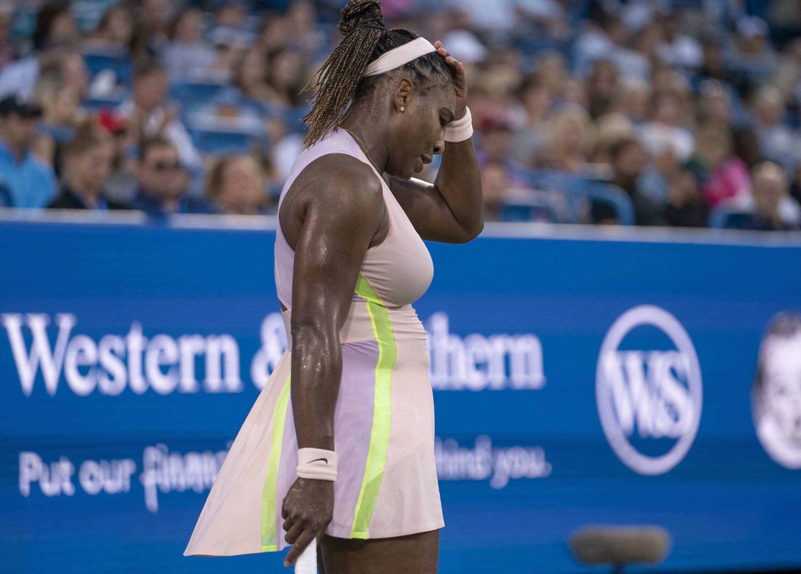 Serena Willams (USA) reacts to a point in her match against Emma Raducanu (GBR) at the Western & Southern Open at the at the Lindner Family Tennis Center.