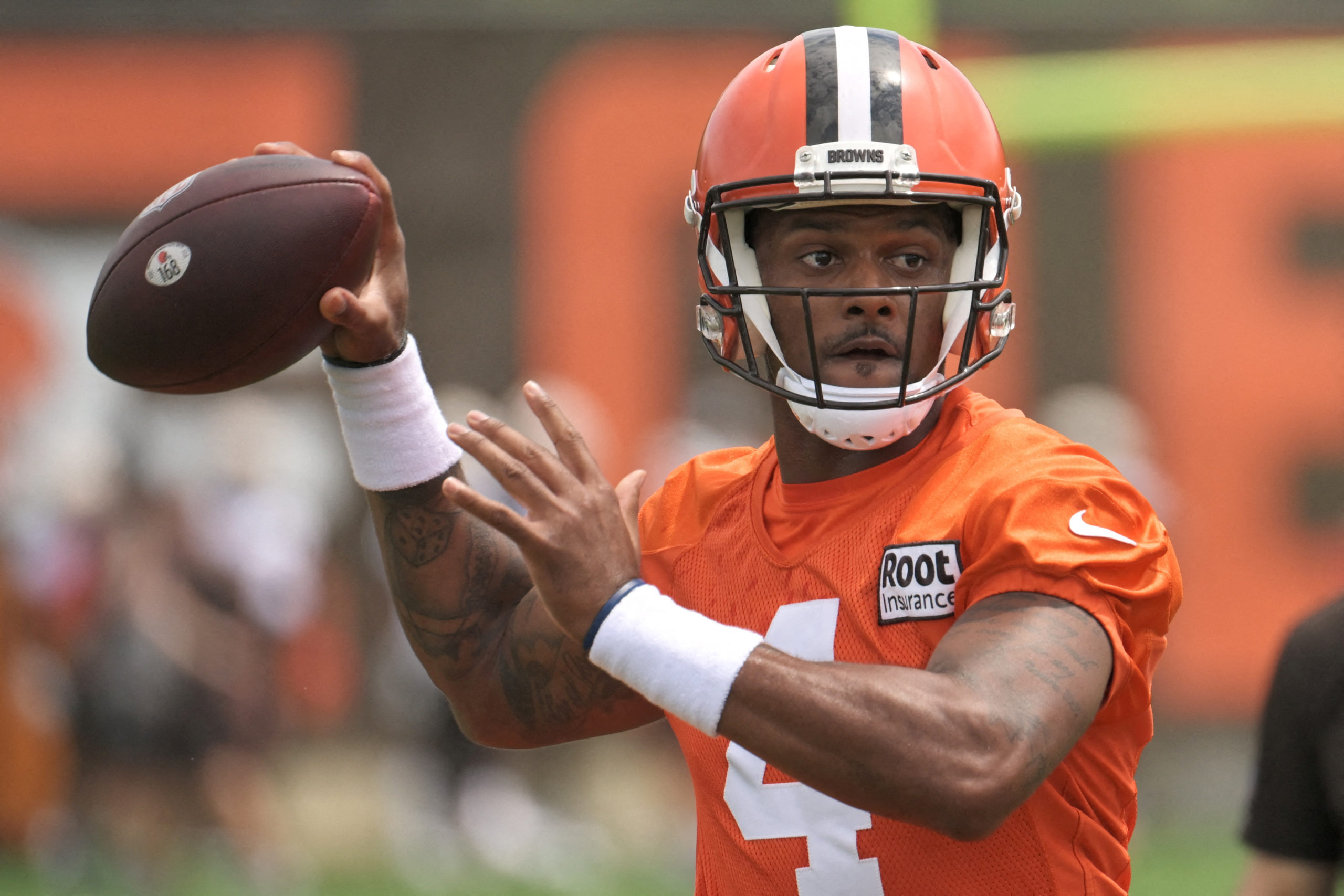 Cleveland Browns quarterback Deshaun Watson (4) throws a pass during training camp at CrossCountry Mortgage Campus. 