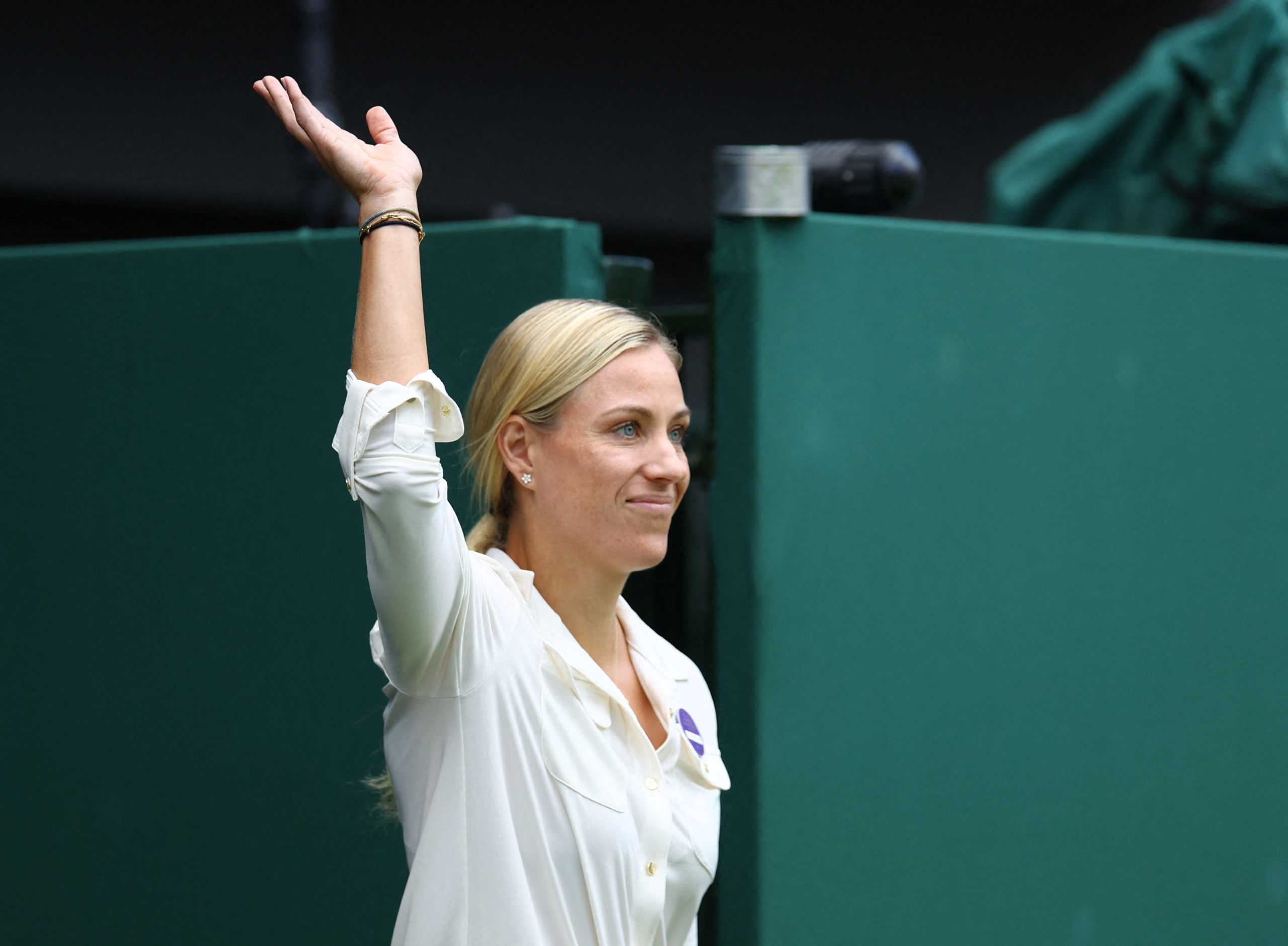 FILE PHOTO: Tennis - Wimbledon - All England Lawn Tennis and Croquet Club, London, Britain - July 3, 2022 Germany's Angelique Kerber is seen during centre court centenary celebrations 