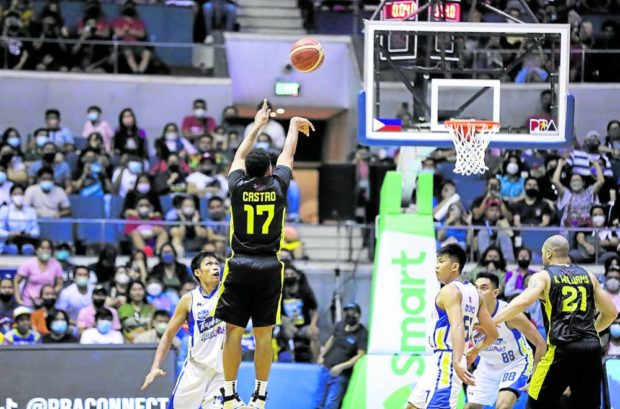 Jayson Castro (right) launches the triple that gave TNT a 2-1 edge in the semifinal series against Magnolia. —PBA IMAGES