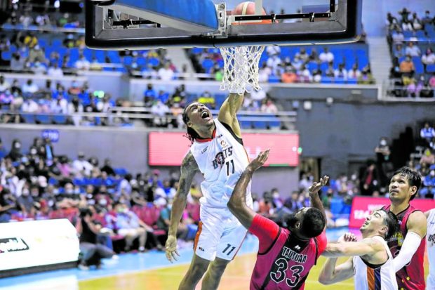 Chris Newsome (left) and the Bolts forge a Game 7 against San Miguel Beer in their side of the Philippine Cup Final Four, with the winner advancing to the title series opposite the TNT Tropang Giga. —PBA Images