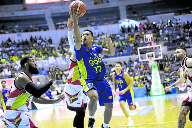 Jayson Castro (No. 17) continues to be a big headache for the San Miguel defense, rescuing TNT in Game 4 to finish with 26 points off the bench. —PBA IMAGES