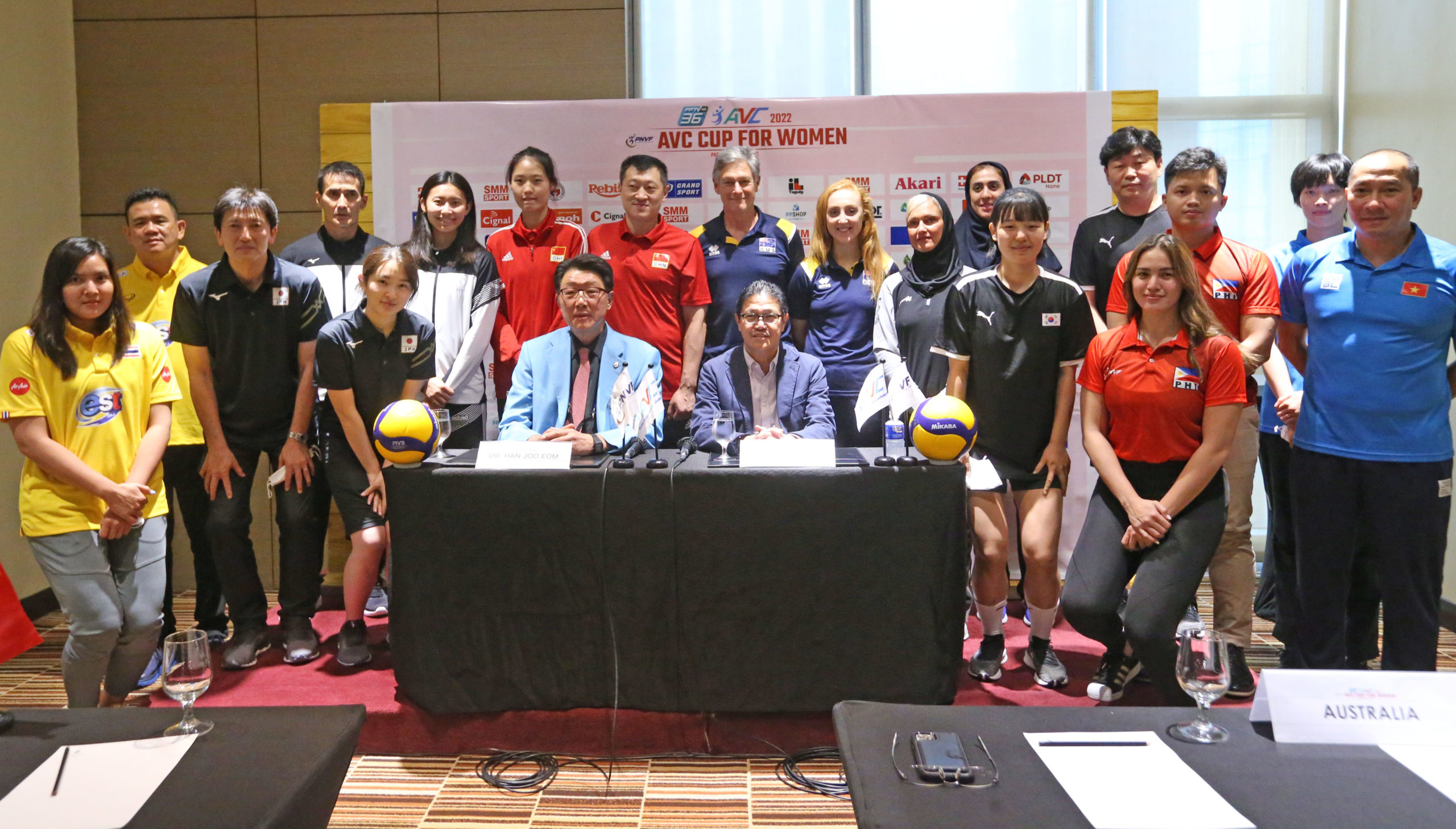 The team captains and coaches from nine participating nations pose with Control Committee President Dr. Eom Han Joo  with Philippine National Volleyball Federation (PNVF) President Ramon "Tats" Suzara during Saturday's press conference for the Asian Volleyball Confederation (AVC) Cup.  