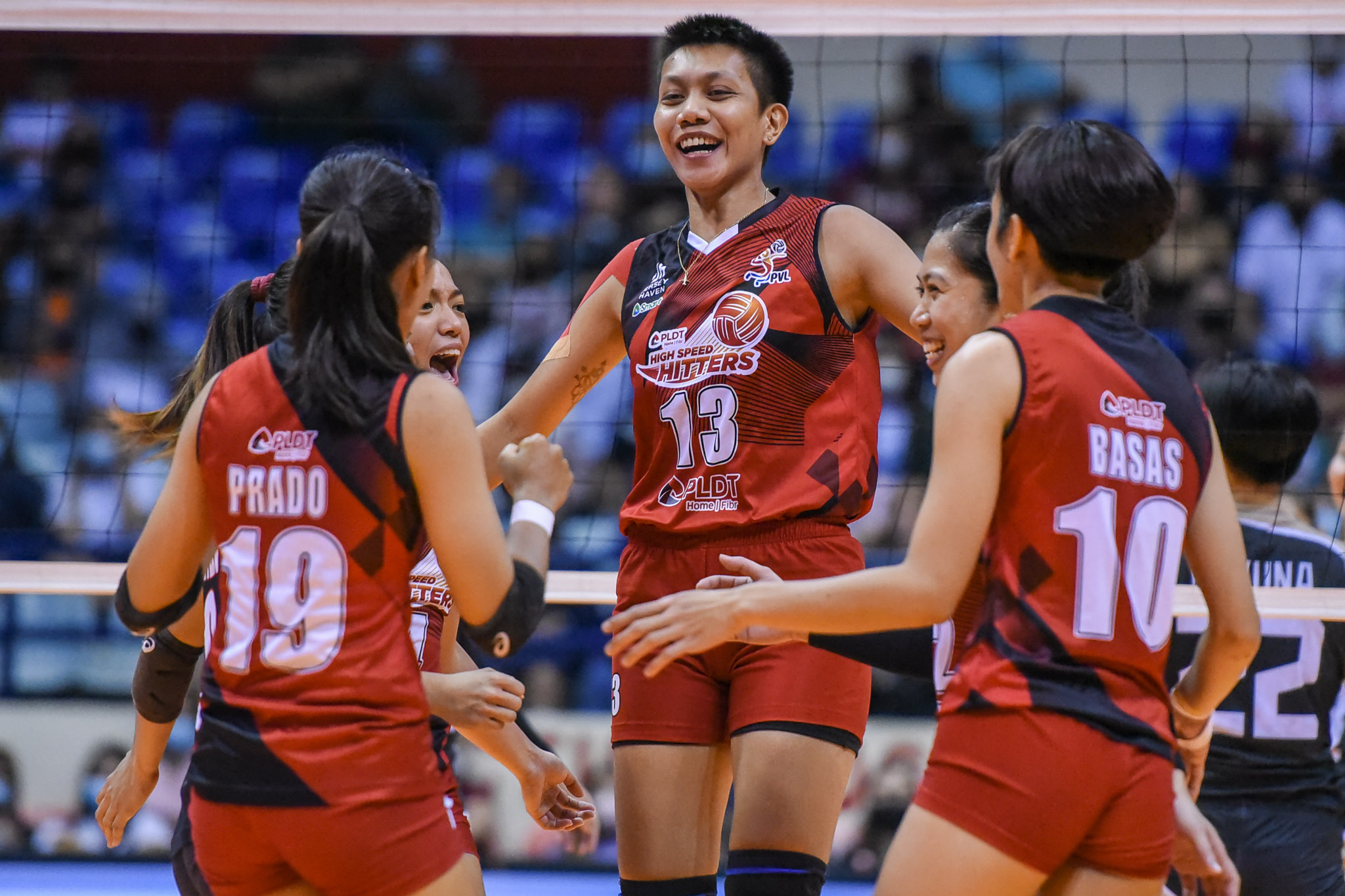 Dell Palomata and PLDT celebrate a point. 