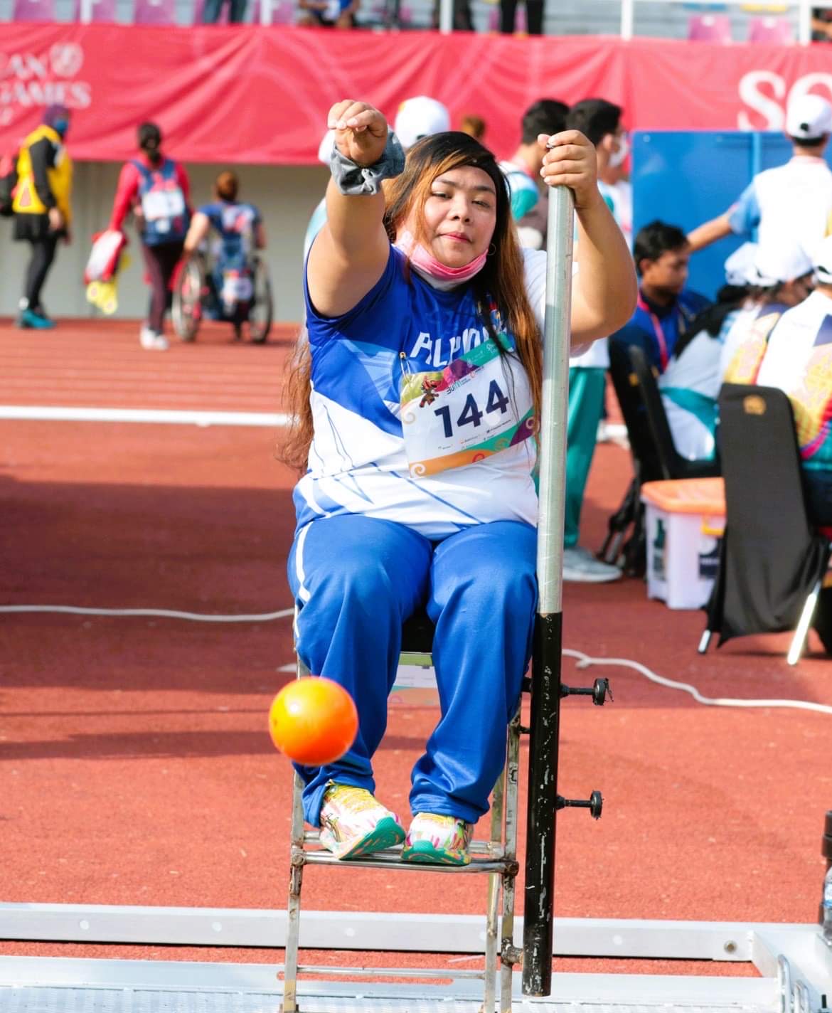 GOLDEN THROW.  Cendy Asusano shows winning form in ruling the women’s shot put F54 in athletic action at the Manahan Stadium in the 11th ASEAN Para Games Wednesday in Surakarta, Indonesia.