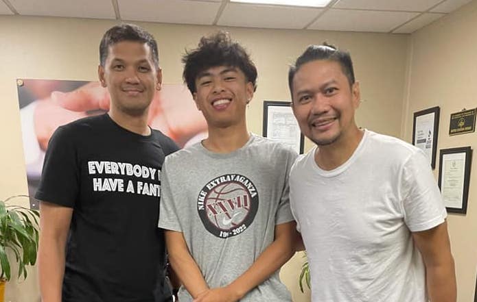 UST's new recruit Kylle Magdangal with UST coaches Rodney Santos and Bal David