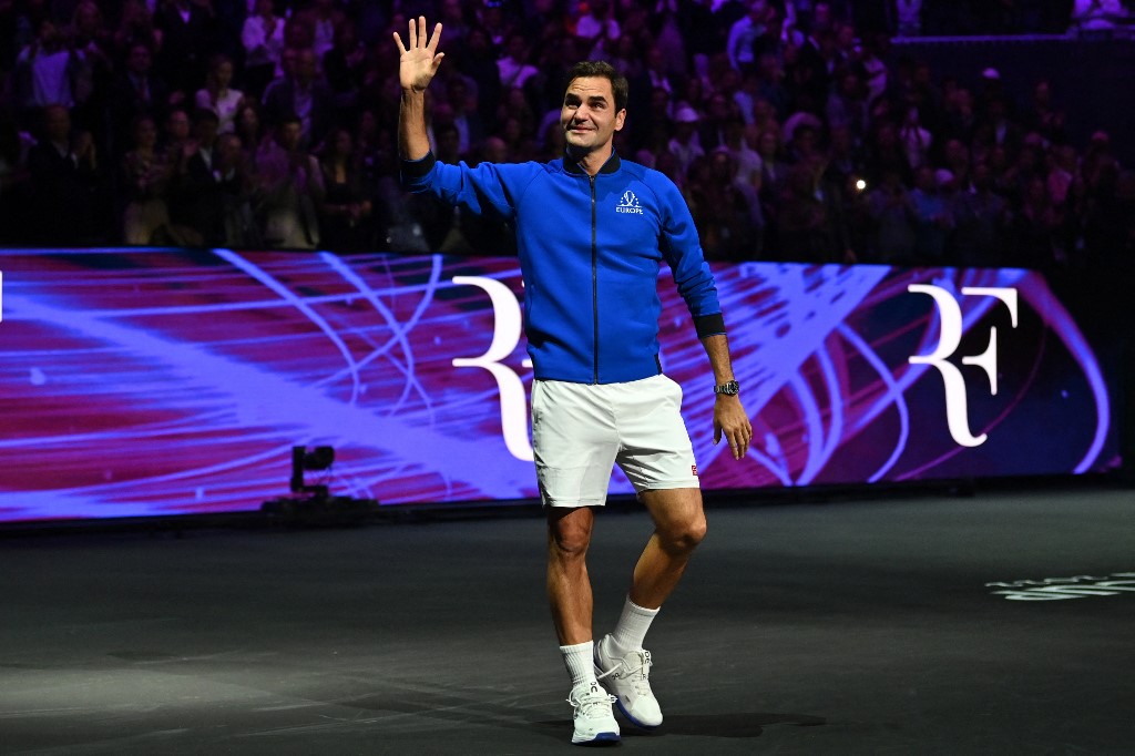 Switzerland's Roger Federer does a lap of honour after playing his final match, a doubles with Spain's Rafael Nadal of Team Europe against USA's Jack Sock and USA's Frances Tiafoe of Team World in the 2022 Laver Cup at the O2 Arena in London, early on September 24, 2022. 