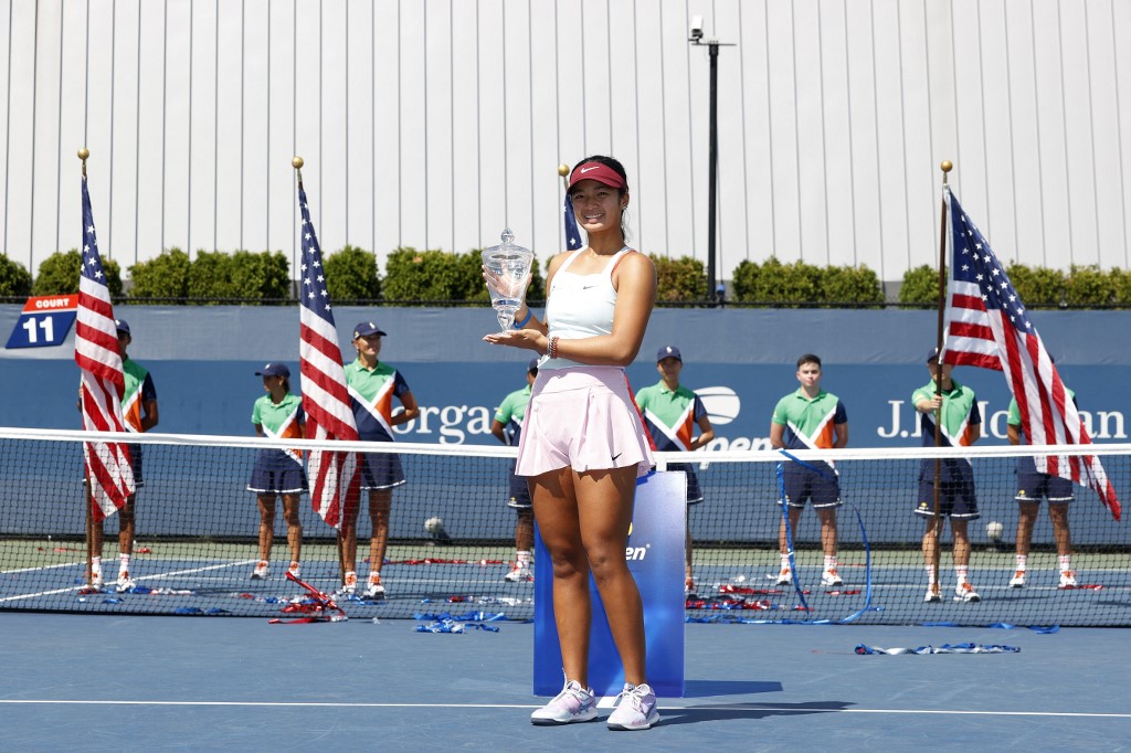 Alex Eala of Philippines celebrates with the championship trophy after defeating Lucie Havlickova of Czech Republic during their Junior Girl's Singles Final match on Day Thirteen of the 2022 US Open at USTA Billie Jean King National Tennis Center on September 10, 2022 in the Flushing neighborhood of the Queens borough of New York City. 