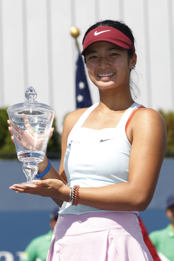 Alexandra Eala of Philippines celebrates with the championship trophy after defeating Lucie Havlickova of Czech Republic during their Junior Girl's Singles Final match on Day Thirteen of the 2022 US Open at USTA Billie Jean King National Tennis Center on September 10, 2022 in the Flushing neighborhood of the Queens borough of New York City. 
