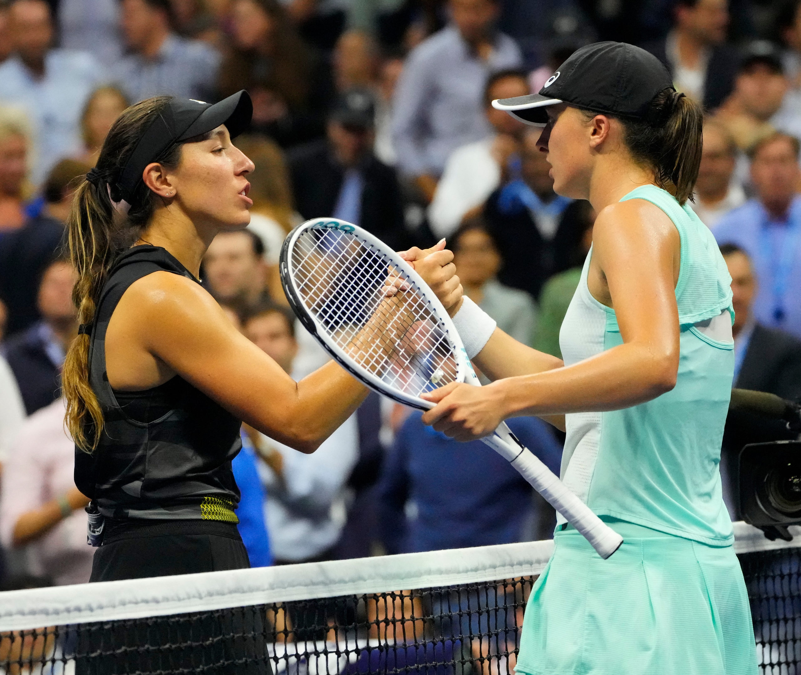  Iga Swiatek of Poland  (right) after beating Jessica Pegula of the USA on day ten of the 2022 U.S. Open tennis tournament at USTA Billie Jean King National Tennis Center