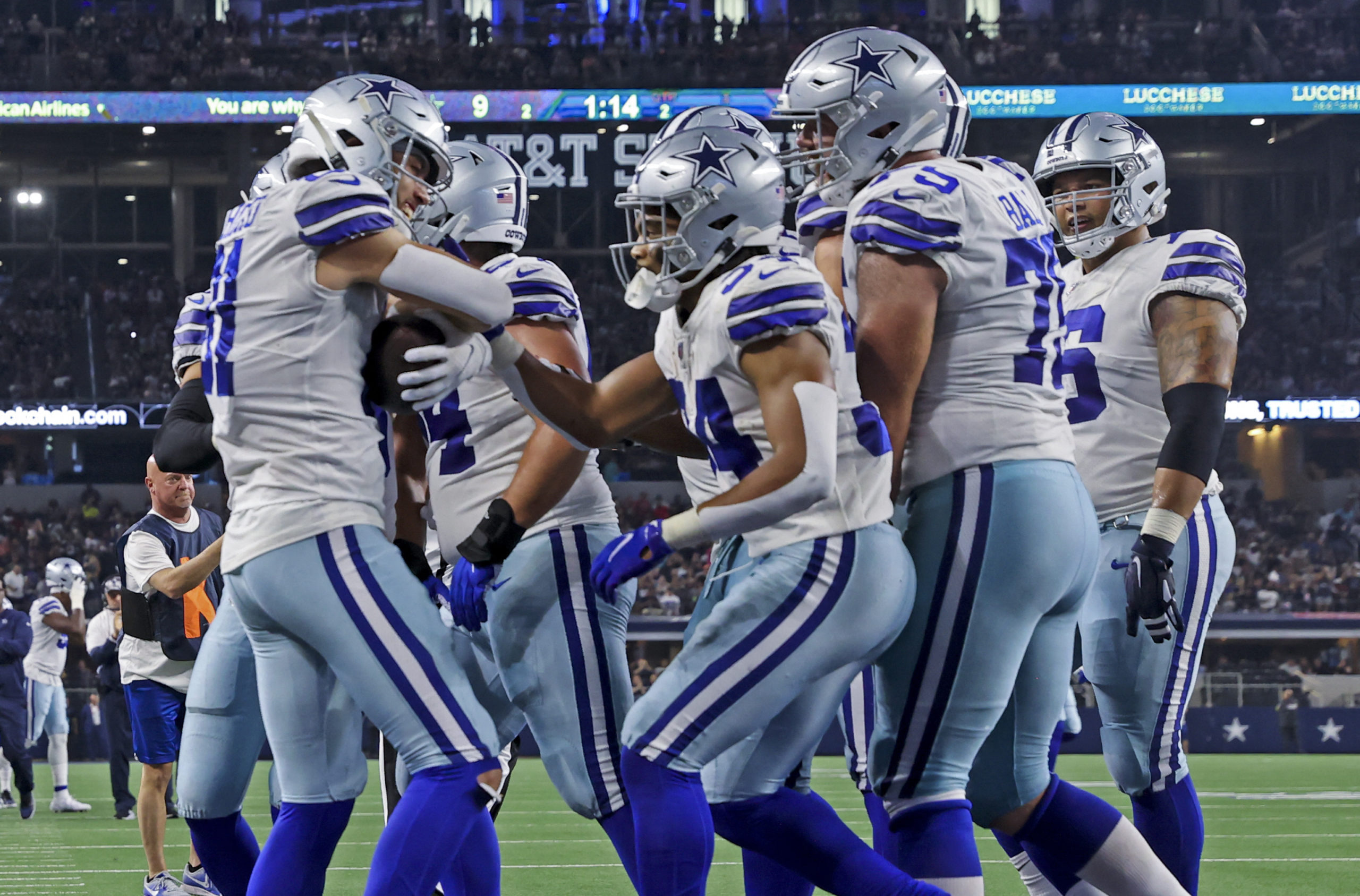 Dallas Cowboys wide receiver Simi Fehoko (81) celebrates with teammates after scoring a touchdown during the second quarter against the Seattle Seahawks at AT&T Stadium. 