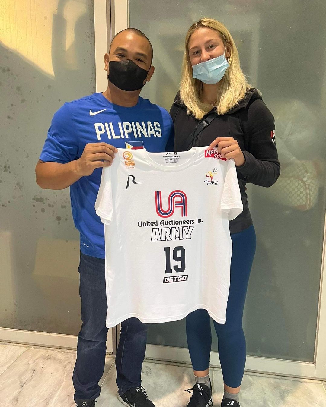 Army coach KungFu Reyes with import Laura Condotta. 