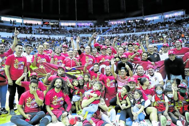 The victorious San Miguel Beermen and their supporters pose for their latest Philippine Cup conquest. —PBA IMAGES