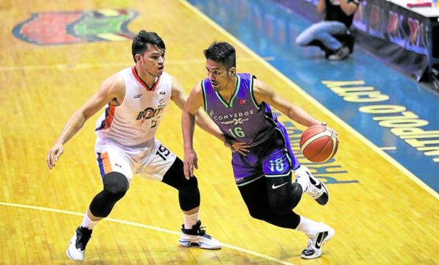 Former Letran ace Kevin Racal (right) reunites with Aldin Ayo at Converge.  —PBA IMAGES