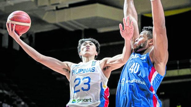 Will Navarro (left) can only spread his wings on an international cage court with Gilas Pilipinas. —FIBA.COM