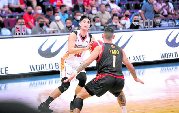 Arvin Tolentino (left) is carving his own niche away from his favorite team. —PBA IMAGES