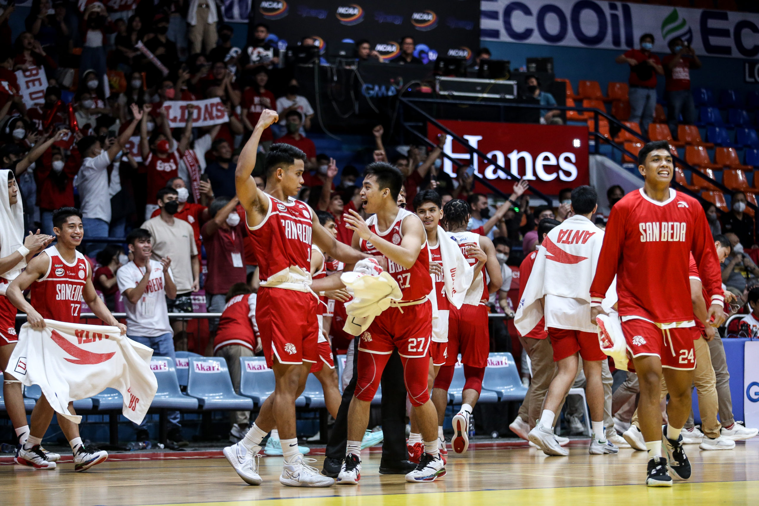 San Beda Red Lions celebrate win over Letran Knights. 