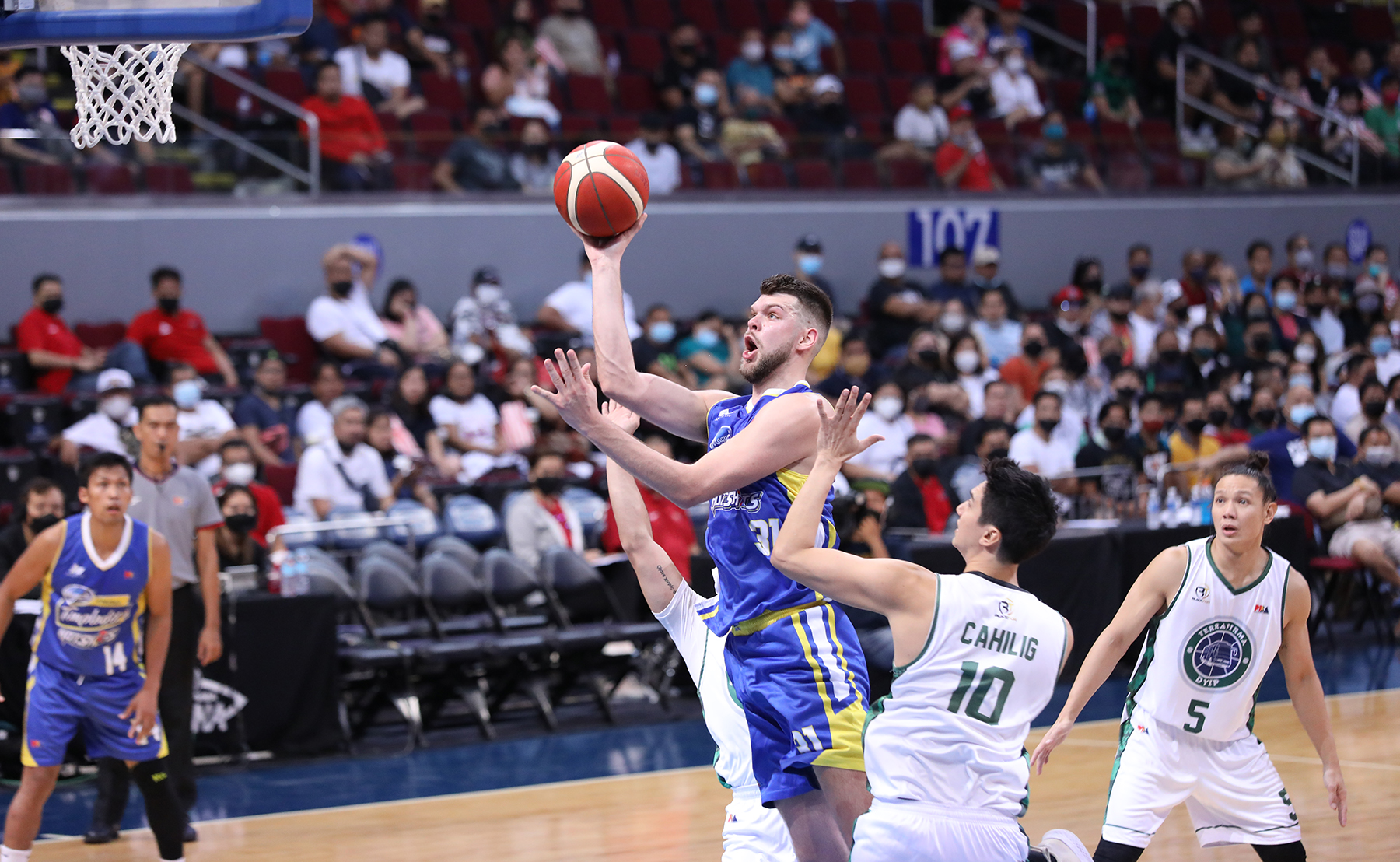 Magnolia’s Nick Rakocevic rises above the Terrafirma defense on the way to a game-high 45 points. —PBA IMAGES