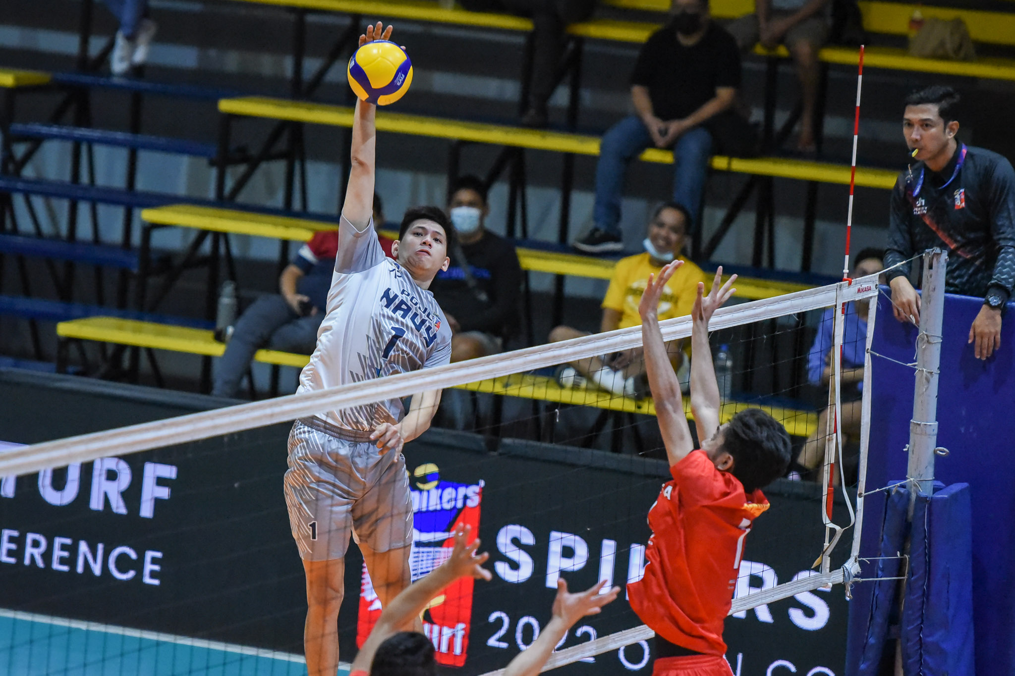 PGJC-Navy's Jao Umandal rises for a hit