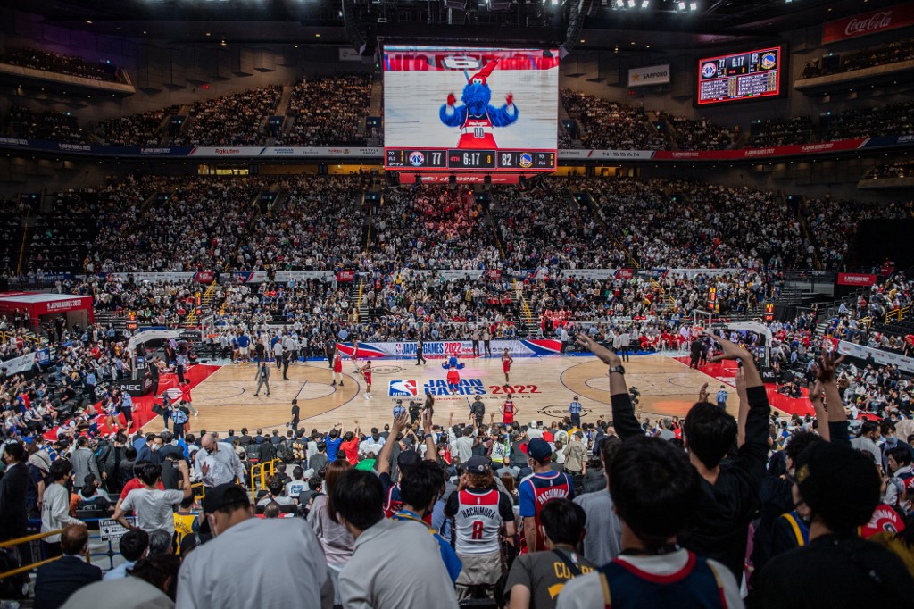 People watch the NBA Japan Games 2022 pre-season basketball game between the Golden State Warriors and the Washington Wizards at the Saitama Super Arena in Saitama on September 30, 2022. 
