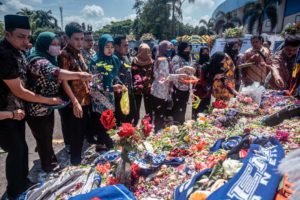 Tear gas, locked gates led to Indonesian football stampede, says spectators