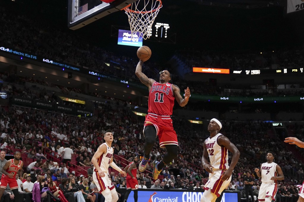  DeMar DeRozan #11 of the Chicago Bulls goes up for a dunk during the second half against the Miami Heat at FTX Arena on October 19, 2022 in Miami, Florida.
