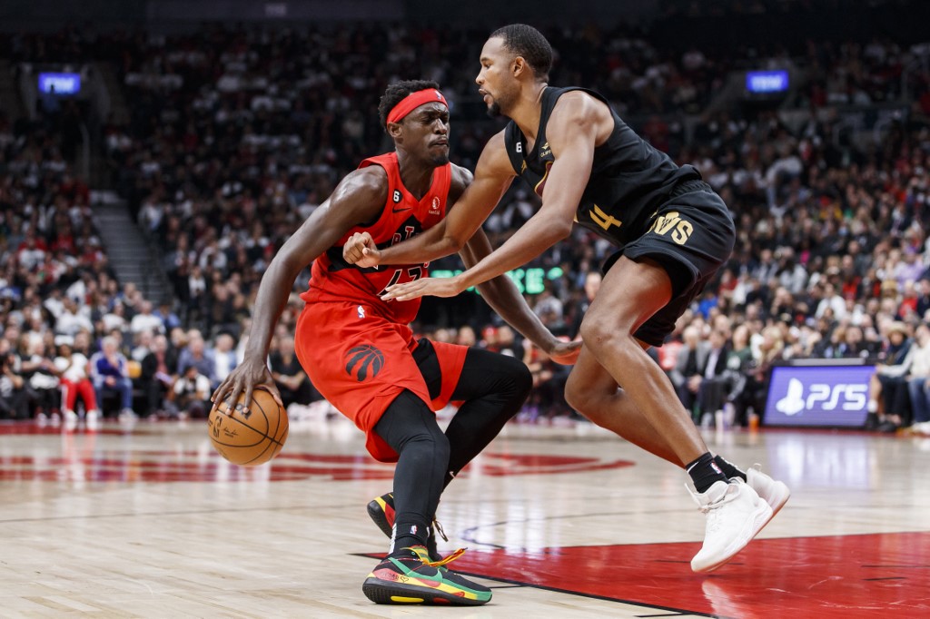 Pascal Siakam #43 of the Toronto Raptors drives against Evan Mobley #4 of the Cleveland Cavaliers during the second half at Scotiabank Arena on October 19, 2022 in Toronto, Canada