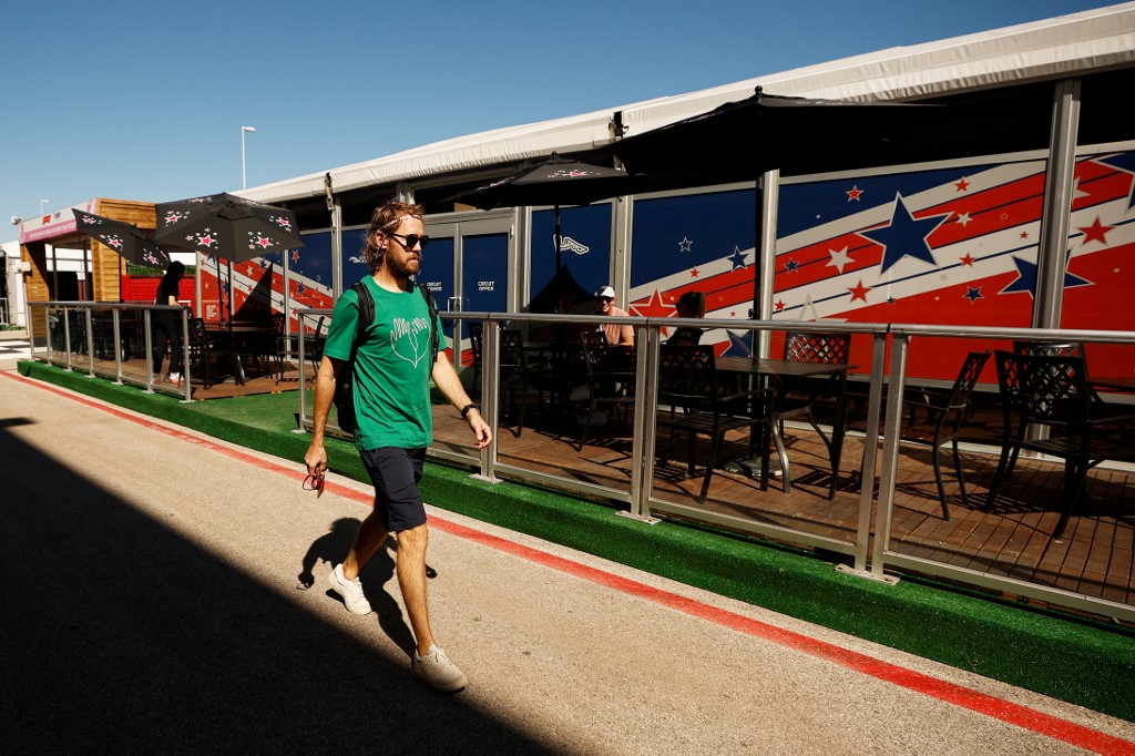 Sebastian Vettel of Germany and Aston Martin F1 Team walks in the Paddock during previews ahead of the F1 Grand Prix of USA at Circuit of The Americas on October 20, 2022 in Austin, Texas.   