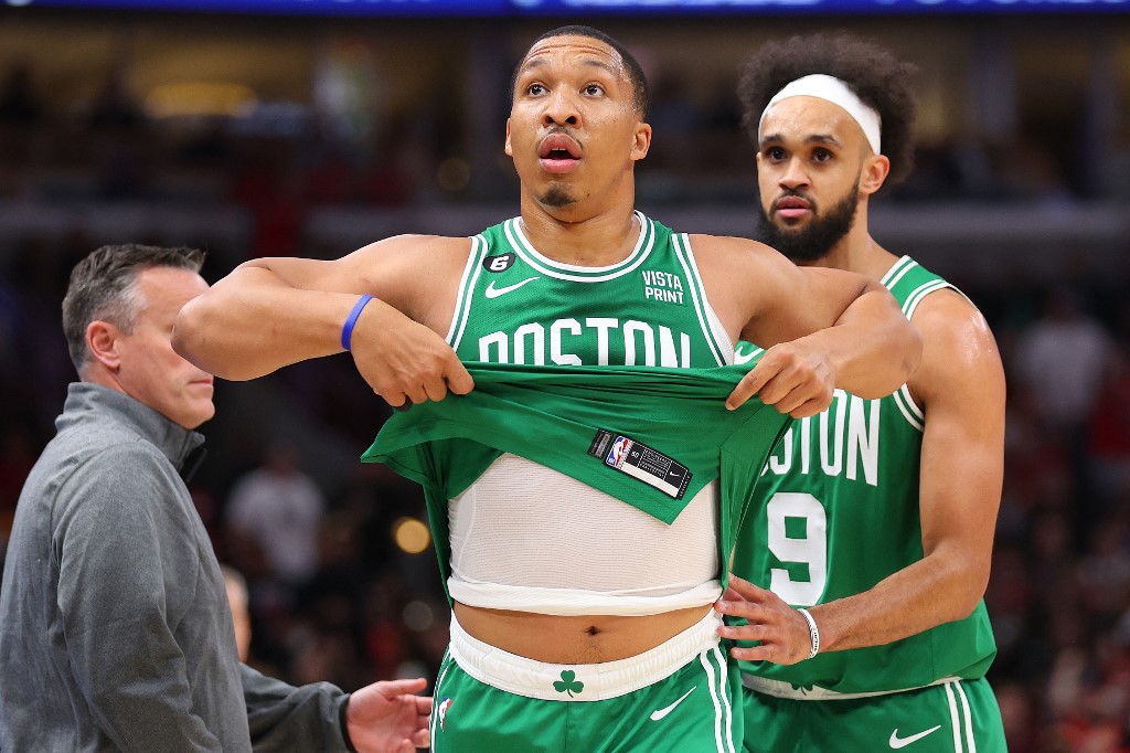  Grant Williams #12 of the Boston Celtics reacts as he leaves the floor after being ejected from the game against the Chicago Bulls during the second half at United Center on October 24, 2022 in Chicago, Illinois. 