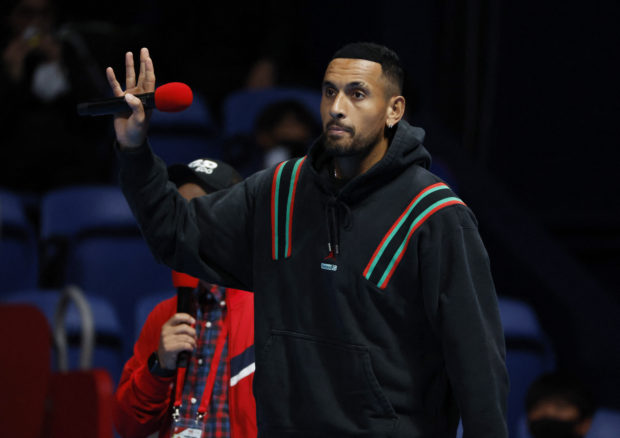 ennis Championships - Ariake Coliseum, Tokyo, Japan - October 7, 2022 Australia's Nick Kyrgios waves to fans after withdrawing from his quarter final match against Taylor Fritz of the U.S. due to injury