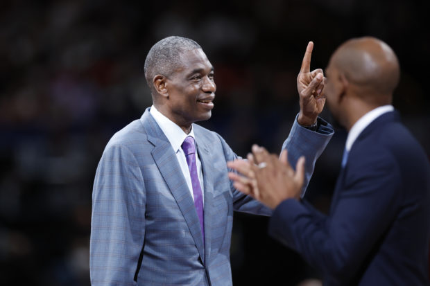 Dikembe Mutombo gestures as he is introduced after the first quarter at Saitama Super Arena. Mandatory Credit: Yukihito Taguchi-USA TODAY Sports