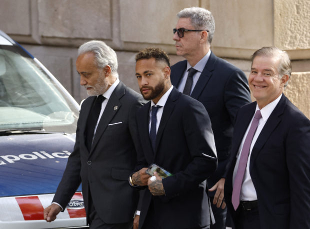 Brazil's Neymar leaves court after standing trial on fraud and corruption charges over the transfer to FC Barcelona from Santos in 2013. REUTERS/Nacho Doce.
