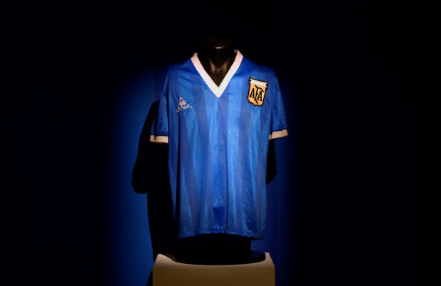 The shirt worn by Argentinian soccer player Diego Maradona in the 1986 World Cup quarter final against England is displayed ahead of it being auctioned by Sotheby's, in London, Britain, April 20, 2022. REUTERS/Toby Melville