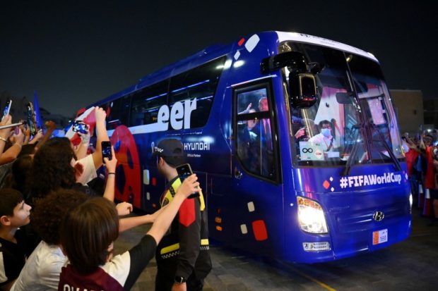 The bus transporting France's players arrives at their team hotel in Doha on November 16, 2022, ahead of the Qatar 2022 World Cup football tournament.